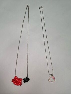 2 x hello kitty necklace